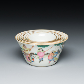 A set of seven Chinese famille rose nesting bowls with narrative design, Daoguang