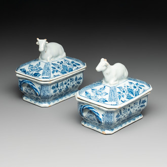 A pair of blue and white Dutch Delft cow-topped butter tubs and covers, 18th C.