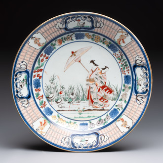 A large Japanese Imari 'Parasol Ladies' dish after Cornelis Pronk, Edo, 18th C.
