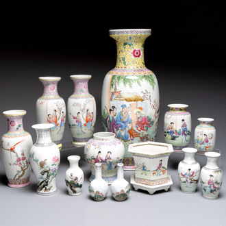 A collection of 13 Chinese famille rose vases and a jardinière, Qianlong mark, 20th C.