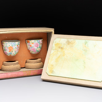 A pair of Chinese famille rose 'millefleurs' cups with presentation box, Jiaqing mark, Republic