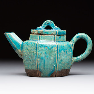 A Chinese Shiwan turquoise-glazed octagonal teapot and cover, seal mark, 18th C.