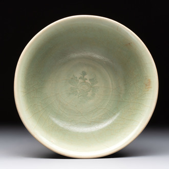 A Chinese Longquan celadon bowl with floral anhua design, Ming
