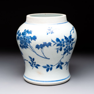 A Chinese blue and white vase with floral design, Transitional period