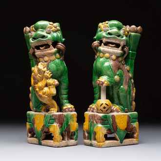 A pair of Chinese sancai-glazed Buddhist lions, 19th C.