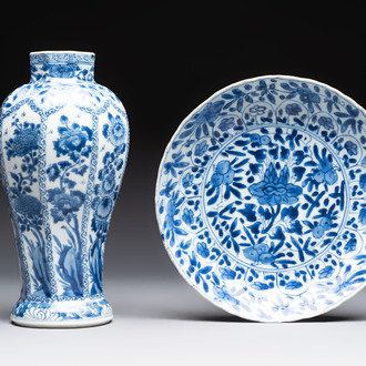 A Chinese blue and white octagonal vase and a plate with floral design, Kangxi