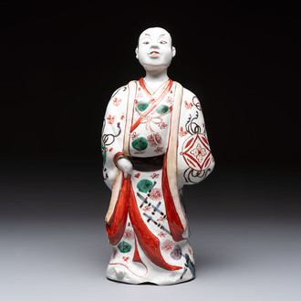 A Japanese Arita Imari figure of a samurai dressed in a kimono, Edo, 17/18th C.