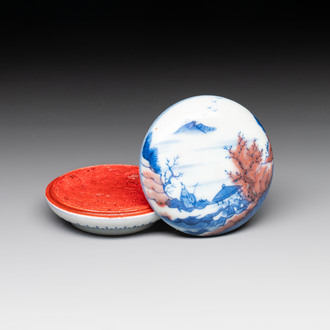 A fine Chinese blue, white and copper-red 'riverscape' seal paste box and cover, Kangxi mark, 19/20th C.