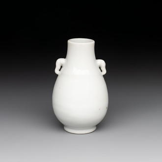 A small Chinese white-glazed 'hu' vase, Qianlong