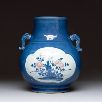 A Chinese blue, white and copper-red powder-blue-ground 'hu' vase, Qianlong