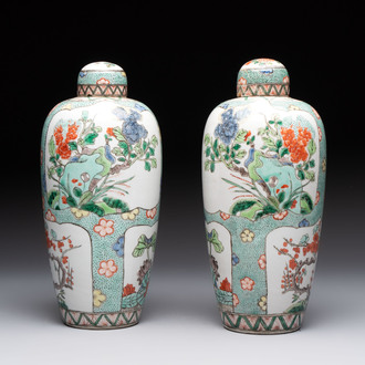 A pair of famille verte-style ovoid jars and covers, Samson, Paris, 19th C.
