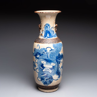 A Chinese Nanking blue and white crackle-glazed 'Buddhist lion' vase, Chenghua mark, 19th C.