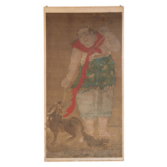Chinese school: 'Deity and foo dog', ink and colour on silk, 16/17th C.