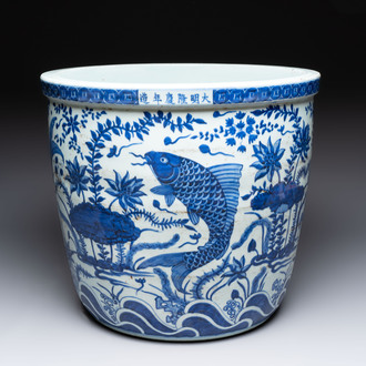 A Chinese blue and white ‘carp’ fish bowl, Longqing mark, 20th C.