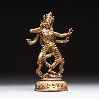 A Nepalese or Tibetan turquoise-inlaid gilt-bronze sculpture of Kurukulla or Red Tara, 15th C. or later