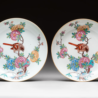 A pair of Chinese Dutch-decorated plates with birds among flowering branches, 18th C.