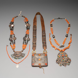 A varied group of four Islamic necklaces and a Koran holder, 19th C.