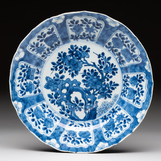A Chinese blue and white dish with floral design, artemisia leaf mark, Kangxi