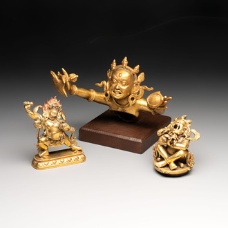 A Sino-Tibetan gilt-bronze Mahakala on stand, a Tibetan Vajradhaka and a Hayagriva, 19/20th C.