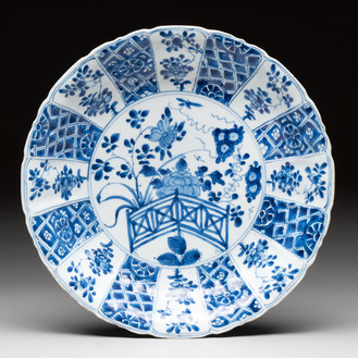 A Chinese blue and white dish with floral design, artemisia leaf mark, Kangxi