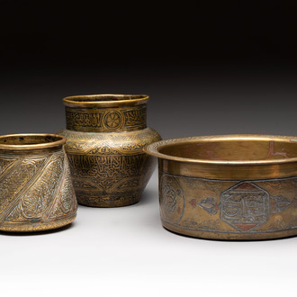 Three 'calligraphic' brass vessels, Qajar, 19/20th C.