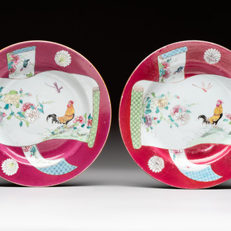 A pair of Chinese famille rose ruby-ground 'scrolls and rooster' plates, Yongzheng