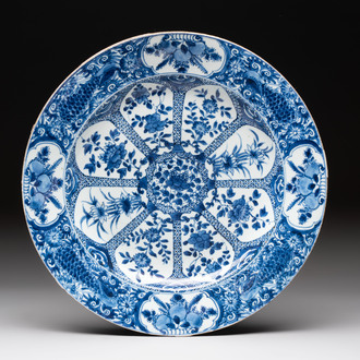 A Chinese blue and white 'peacock border' dish, Kangxi