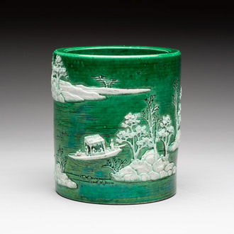 A Chinese verte biscuit 'river landscape' brush pot, artemisia leaf mark, 19th C.