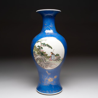A Chinese famille rose powder-blue-ground vase, 19th C.