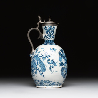 A blue and white Dutch Delft pewter-mounted armorial jug, late 17th C.