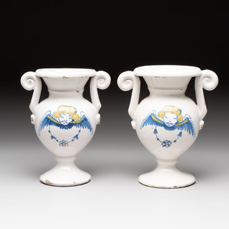 A pair of blue, white and yellow Dutch Delft altar vases, late 17th C.
