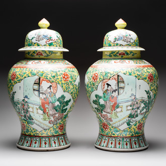 A pair of Chinese famille verte yellow-ground 'Xi Xiang Ji' vases and covers, 19th C.