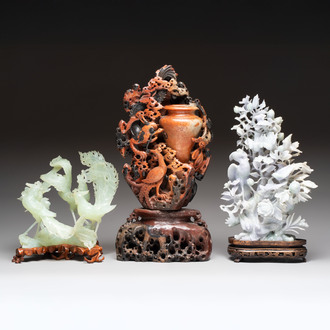 A Chinese soapstone vase with stand and two jadeite carvings on wooden stands, 19/20th C.