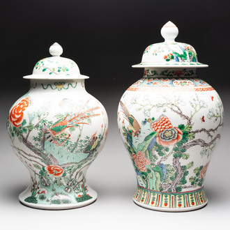 Two Chinese famille verte 'birds and flowers' vases and covers, 19th C.
