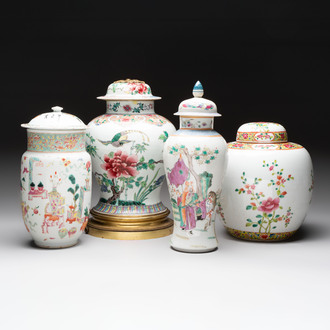 Three Chinese famille rose covered vases, one on a gilt bronze stand, and a covered jar, 19/20th C.
