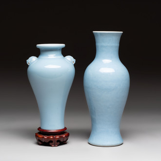 Two Chinese claire-de-lune vases, one with a wooden stand, Kangxi and Yongzheng mark, 19th C.