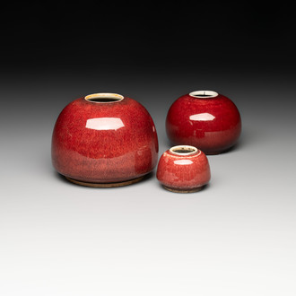 Three Chinese copper-red-glazed water pots, Kangxi mark, 19th C.