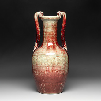 A Chinese peachbloom-glazed vase with dragon-form handles, 18th C.