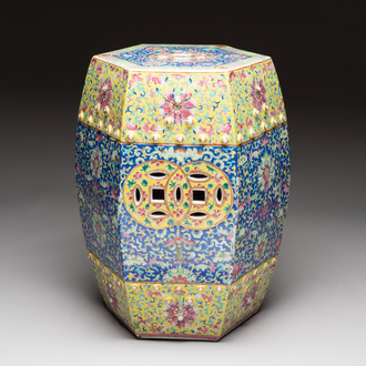 A Chinese famille rose blue and yellow-ground hexagonal garden seat, 19th C.
