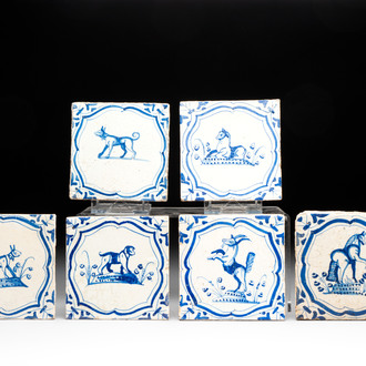Six blue and white Dutch Delft 'accolades borders' 'animals' tiles, 17th C.