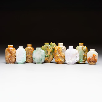 A group of nine Chinese jadeite snuff bottles, 20th C.