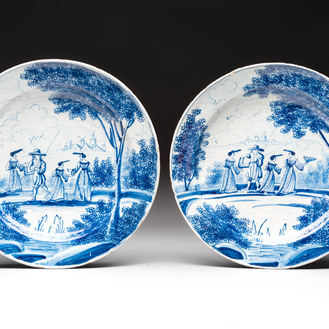 A pair of blue and white Dutch Delft dishes with a pastoral scene, 18th C.