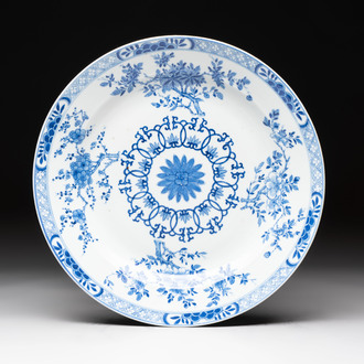 A Chinese blue and white dish with floral design, Kangxi mark, 19th C.