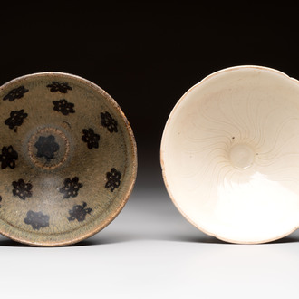 A Chinese Jizhou papercut resist-decorated 'plum blossom' bowl and a white-glazed bowl, Southern Song/Ming