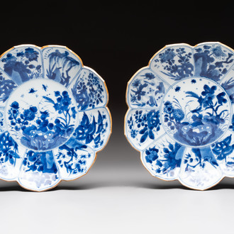 A pair of Chinese blue and white lotus-form 'grasshopper' plates, Kangxi