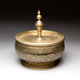 A brass betel bowl and cover with black-enamelled and engraved design, Indonesia, 19th C.