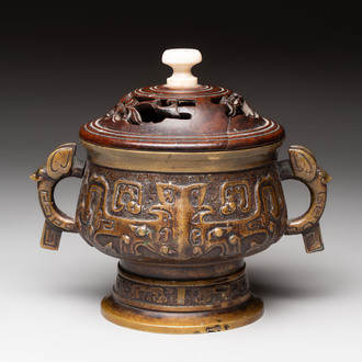 A Chinese archaistic bronze censer with a wooden cover, Xuande mark, 19th C.