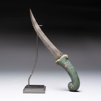 A fine Mughal dagger with a ruby- and gold-inlaid celadon jade hilt, 18th C.