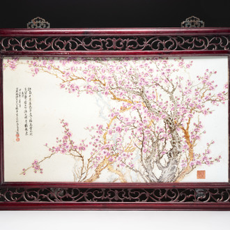 A large Chinese famille rose plaque with plum blossom design in wooden frame, signed Wang Heting 王鹤亭, dated 1984