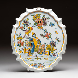 A polychrome Dutch Delft chinoiserie plaque, 18th C.